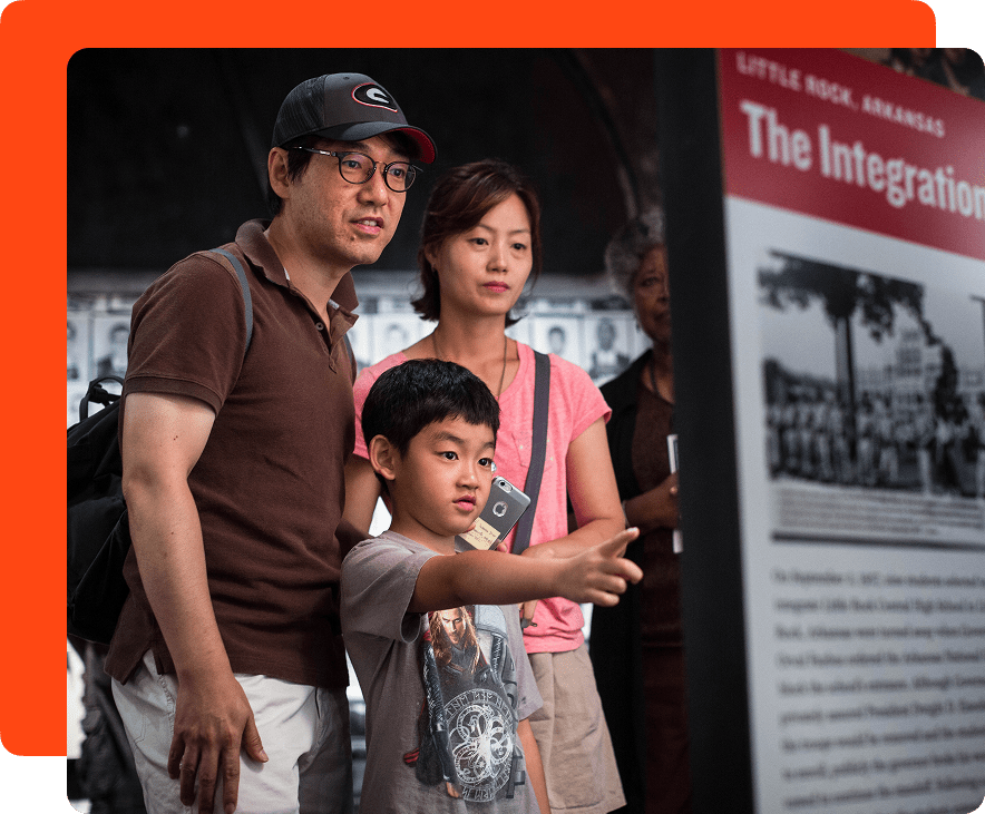 Family enjoying an exhibition at The National Center for Civil and Human Rights