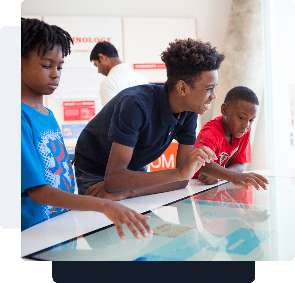 Group of youth viewing an exhibit at NCCHR