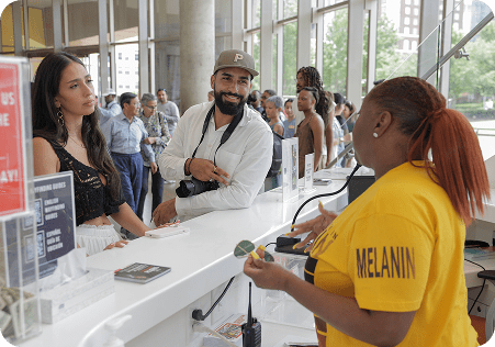 Visitors seeking information at the help desk of The National Center for Civil and Human Rights