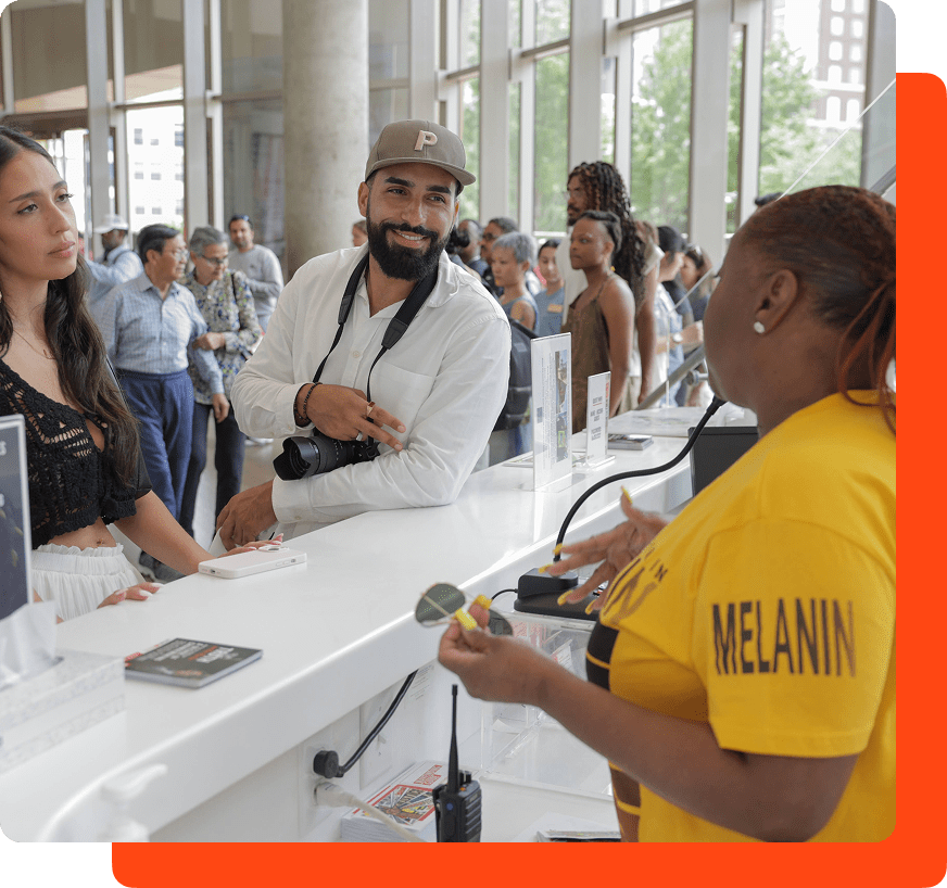 NCCHR visitor asking a question at the museum help desk
