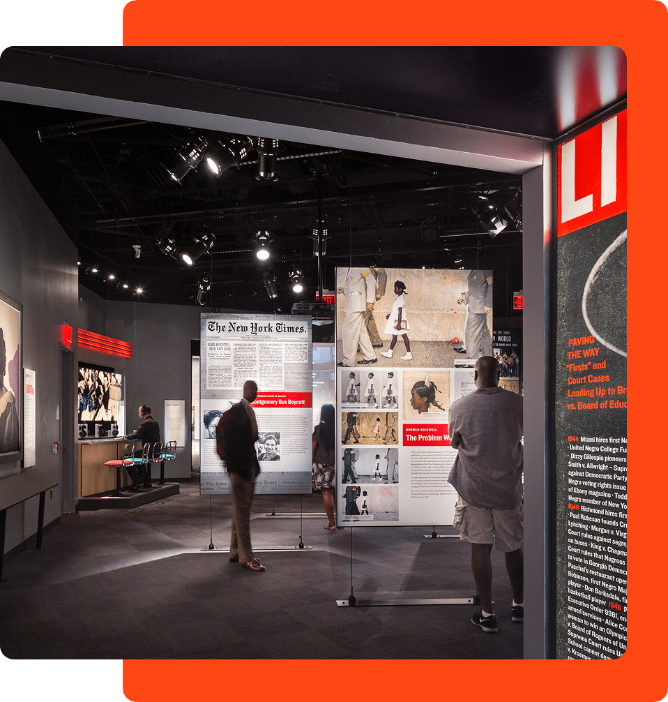 Visitors reading information about exhibitions at The National Center for Civil and Human Rights