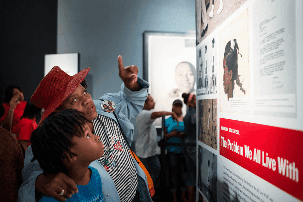 Visitors exploring an exhibit at NCCHR