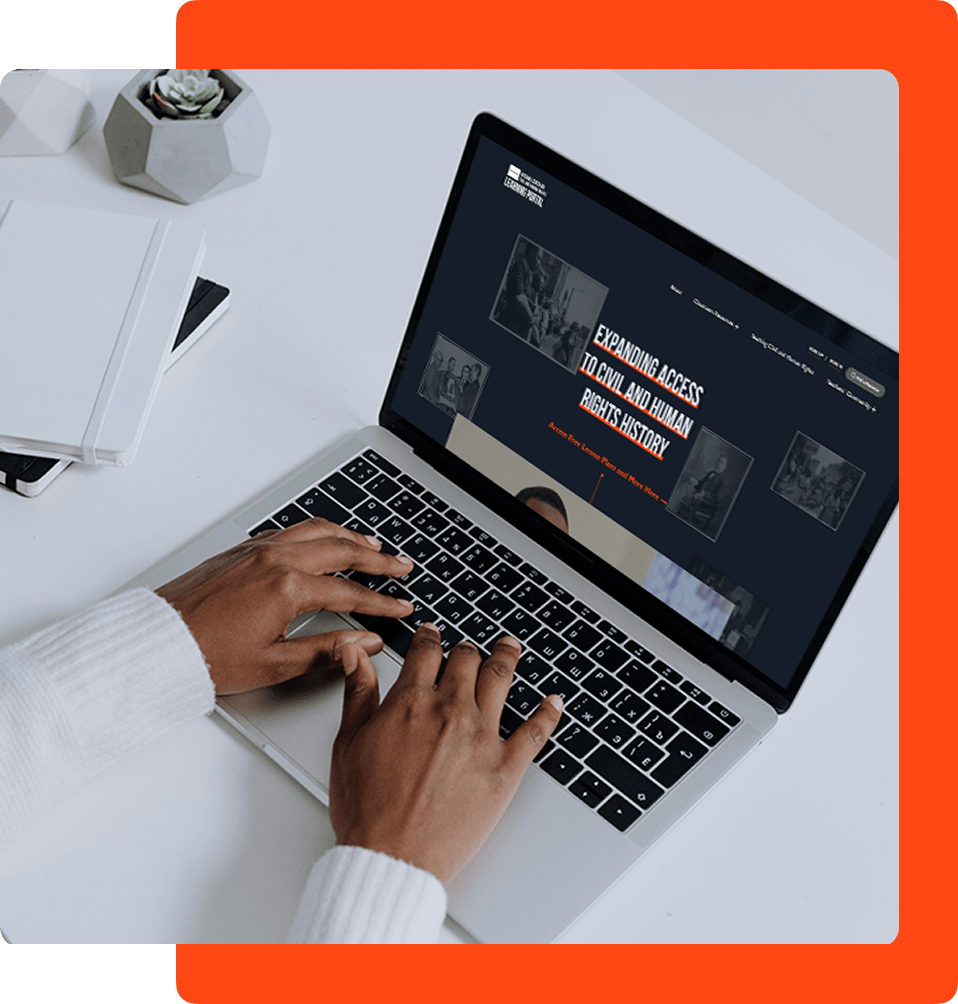 Person accessing the online learning portal on a laptop