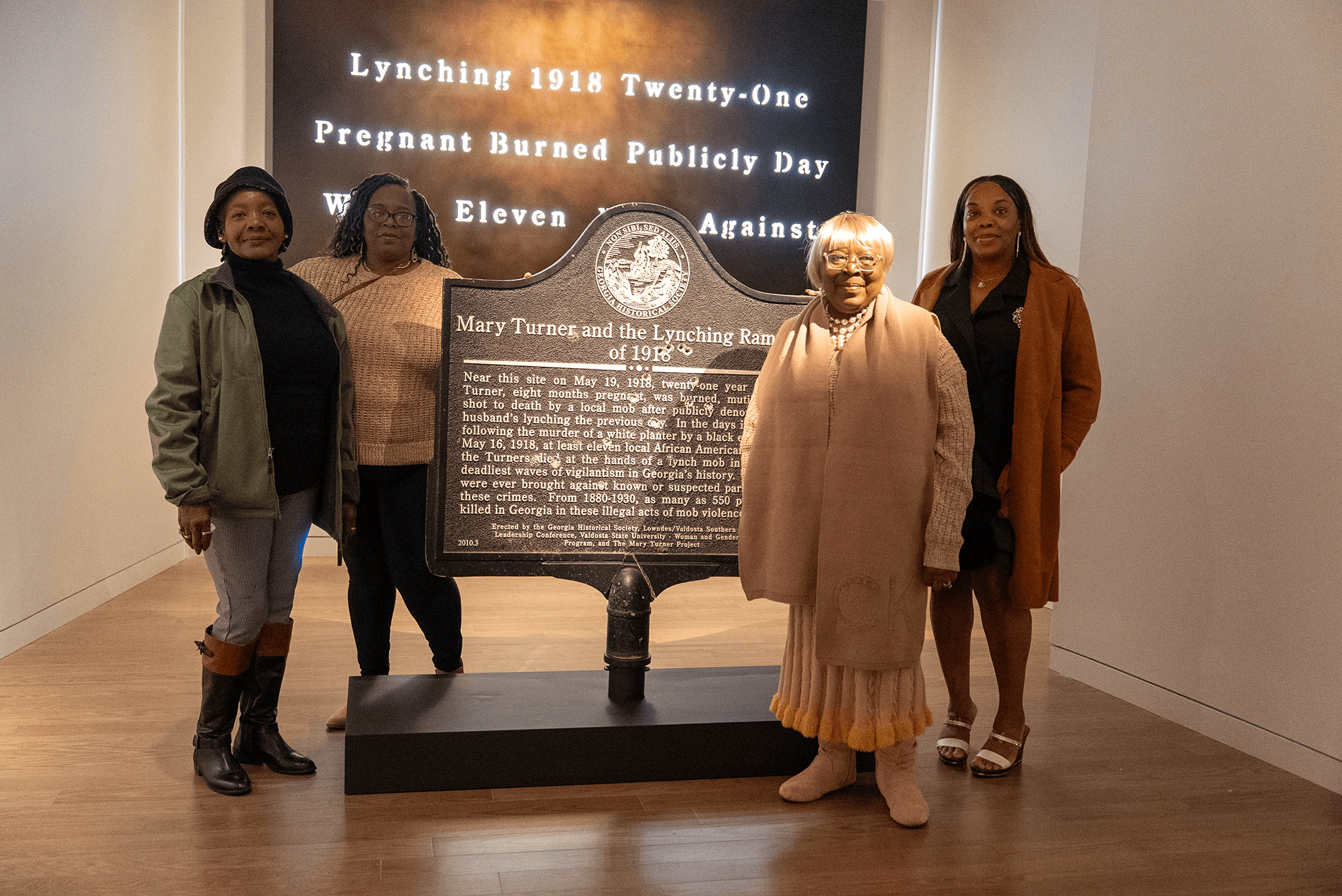 Visitors at Broken Promises exhibition