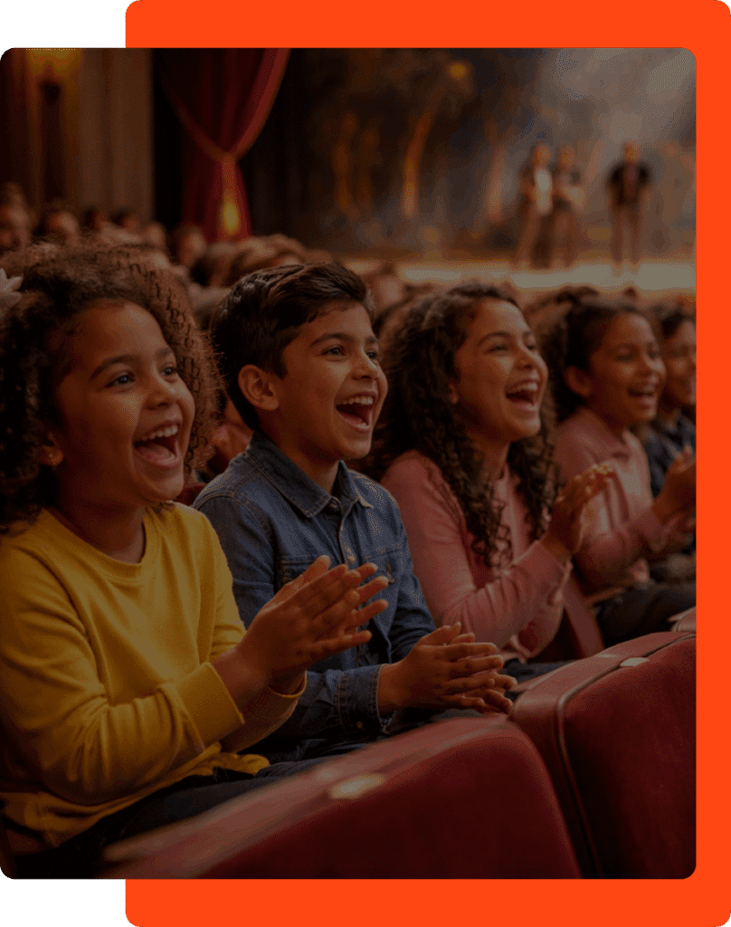 Children laughing at a theater performance