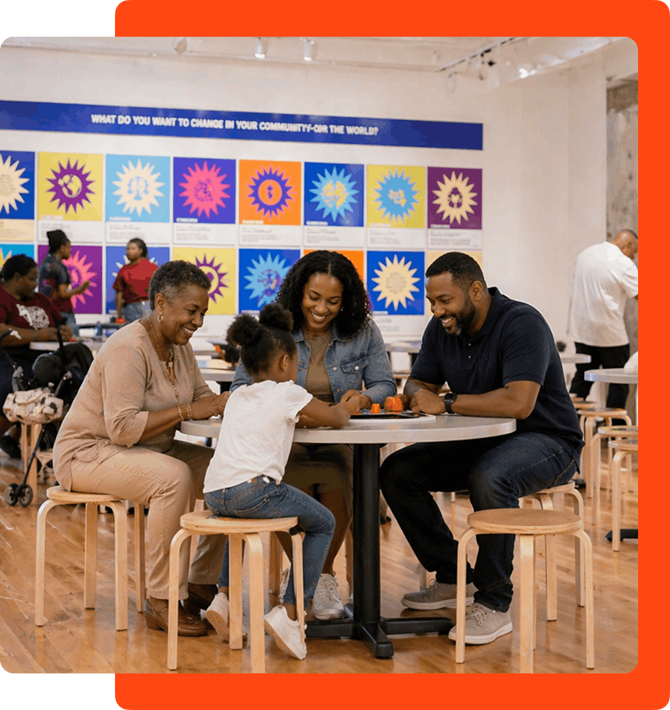 family at a table in a gallery at NCCHR