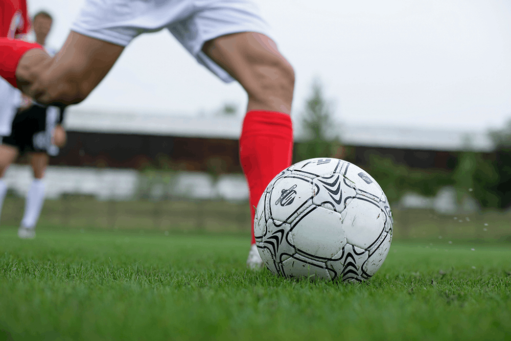 Soccer player playing soccer