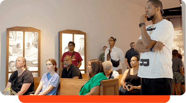 Visitors enjoying an exhibit at NCCHR